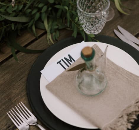 bottle on plate at wedding