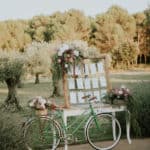bicycle decorated with wedding bouquets