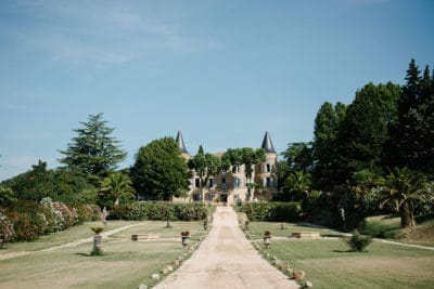 view up the driveway to beautiful chateau robernier French wedding venue