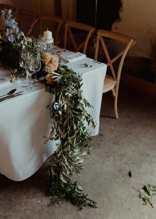 wedding table decorated with leaves