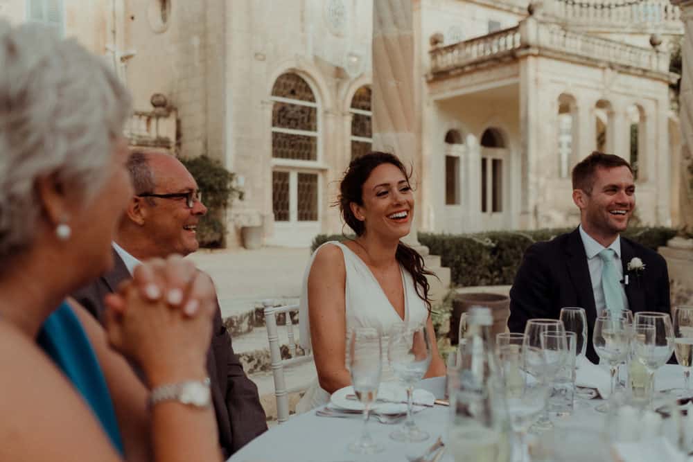 bride and groom laughing at maltese wedding