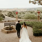 Image of couple walking through the grounds at wedding venue Cigarral de las Mercedes