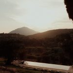 the hills of corfu at sunset