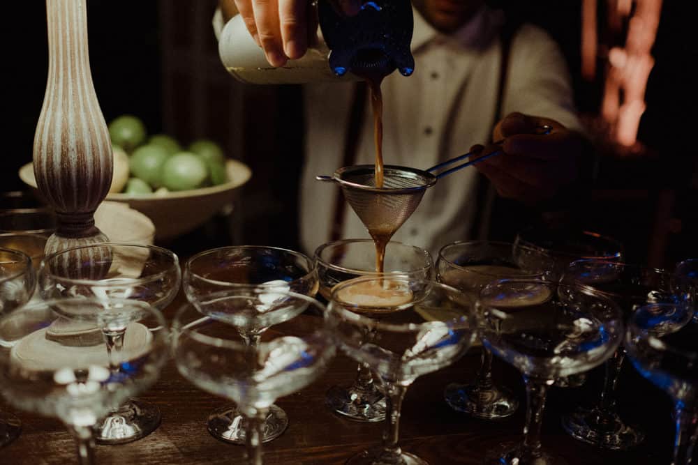 wedding bartender making coffee martini