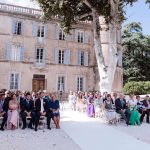 guests seated and ready for wedding at chateau de robernier
