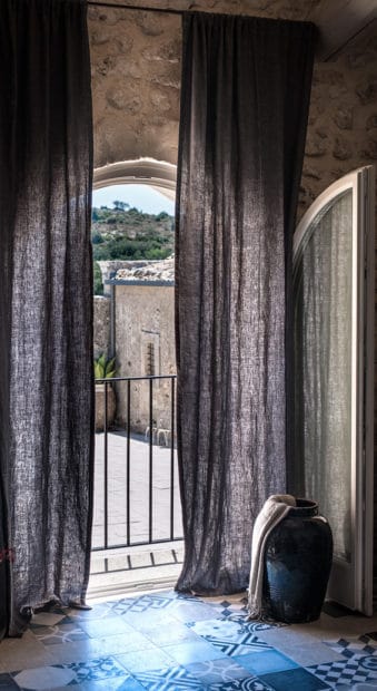 gauzy curtains in room of wedding villa