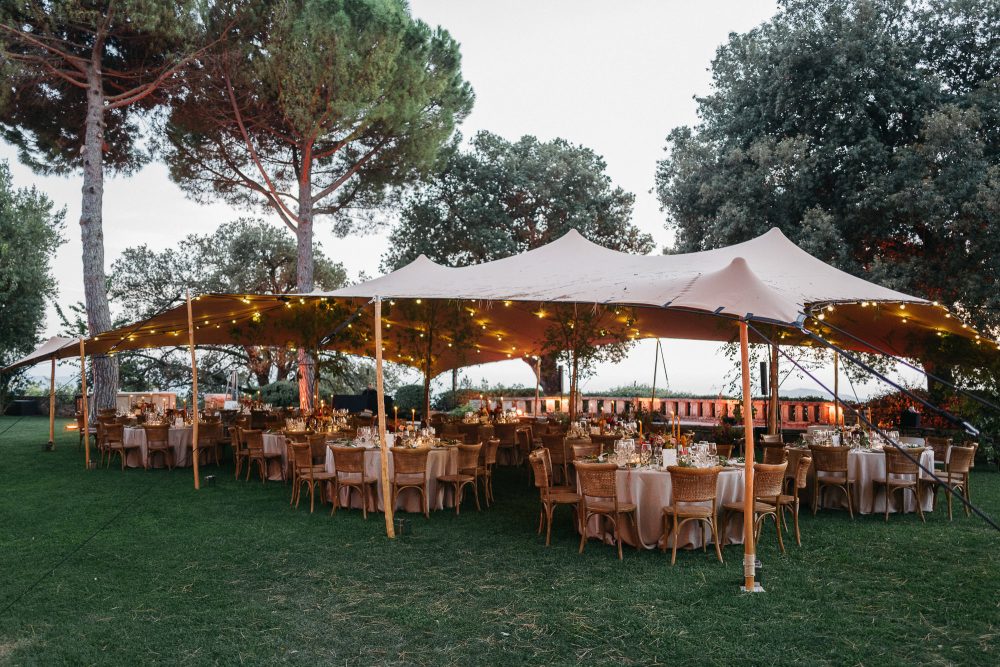 elif and arnolds wedding dinner served beneath white tents