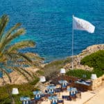 cap rocat wedding venue beach restaurant with flag flying in the wind