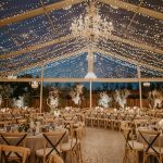 wedding tables with hanging fairy lights zoomed in