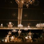 multiple chandeliers light up wedding night