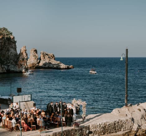 wedding taking place by the ocean