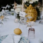 blue and white plates on wedding table