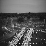long dining tables laid out for wedding in puglia