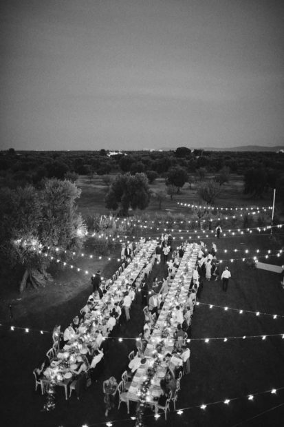 long dining tables laid out for wedding in puglia