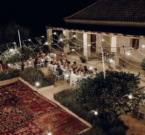 wedding guests enjoy the outdoor reception at spanish wedding venue case la siesta