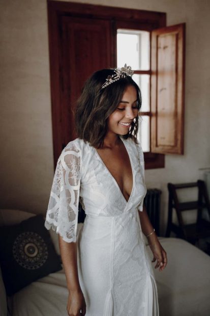 bride in her lace wedding dress with embellished crown at spanish wedding venue casa la siesta