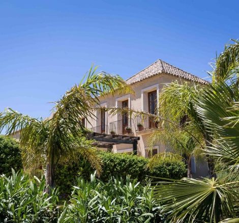 exterior view of casa la siesta a spanish wedding venue from the gardens