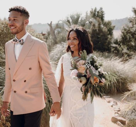 beautiful bride walks hand in hand with groom spanish wedding venue casa la siesta