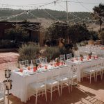 the sun shines upon elaborately arranged wedding tables spanish wedding venue casa la siesta