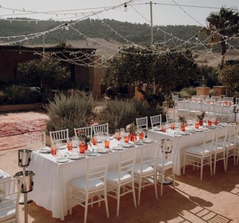 the sun shines upon elaborately arranged wedding tables spanish wedding venue casa la siesta