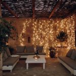 rustic seating area with dangling fairy llights spanish wedding venue casa la siesta