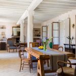 dining room with glass vase and French windows at spanish wedding venue casa la siesta in spain