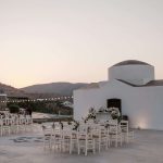 empty chairs outside a ktima lindos wedding venue in rhodes