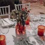 orange glassware on wedding table spanish wedding venue casa la siesta