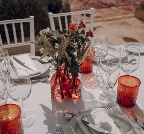 orange glassware on wedding table spanish wedding venue casa la siesta