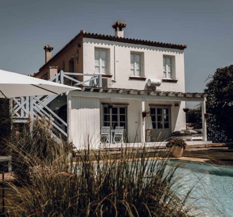 sparkling blue pool outside the separate accommodation for wedding guests at spanish wedding venue casa la siesta