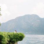 bride and groom in wedding villa garden overlooking lake como wedding venue villa balbiano