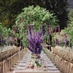 wedding tables with purple flowers at villa balbiano