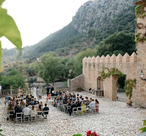 wedding guests gathered in courtyard
