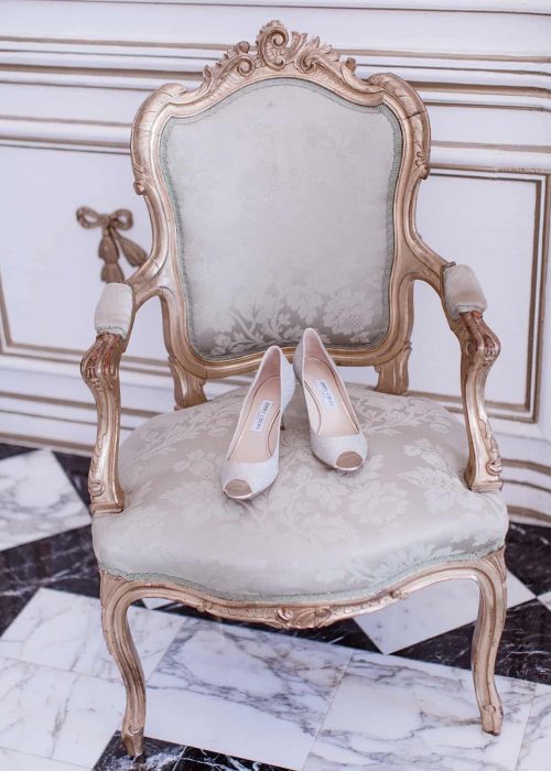 pair of high heel shoes at wedding venue
