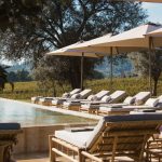 outdoor pool and loungers at terra rosa country house and vineyards wedding venue in portugal