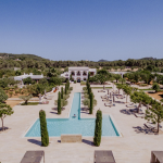 The long T shaped pool area at Ca Na Xica a unique Wedding Venue in Ibiza