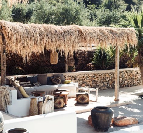 canopied area with bohemian furnishings at pure house ibiza wedding venue