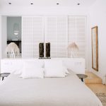 white bright bedroom for wedding guests at ibiza wedding venue pure house