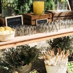 display of glass jars and fruit for a summer wedding at mallorca wedding venue son doblons in spain