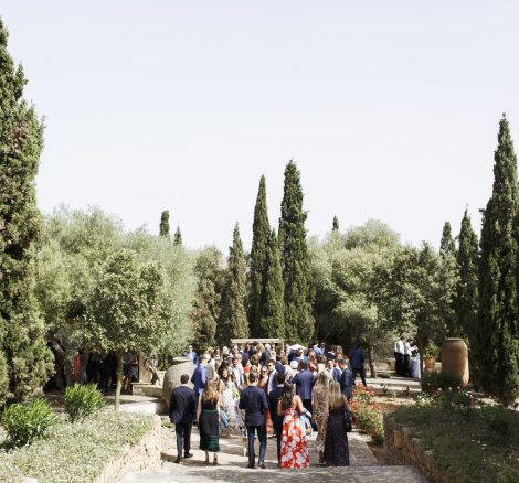 wedding guests mingling outside before the wedding ceremony at mallorca wedding venue son doblons in spain