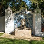 outdoor foundation with mosaic white wall behind at wedding venue casa sacoto in portugal