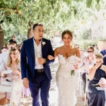 father walking the bride down the aisle at outdoor ceremony at villa catalina Spanish wedding venue