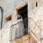 bride on the balcony at Spanish wedding villa villa catalina