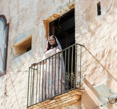 bride on the balcony at Spanish wedding villa villa catalina