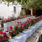 wedding banquet tables outside on the terrace at Spanish wedding venue villa catalina
