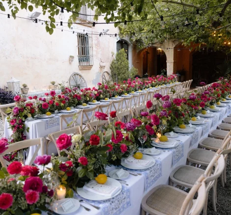 wedding banquet tables outside on the terrace at Spanish wedding venue villa catalina