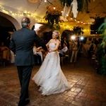 bride and groom dancing in a bodega at Spanish wedding venue villa catalina