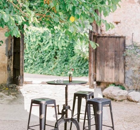black metal stools for wedding reception drinks at spanish wedding venue Villa Catalina