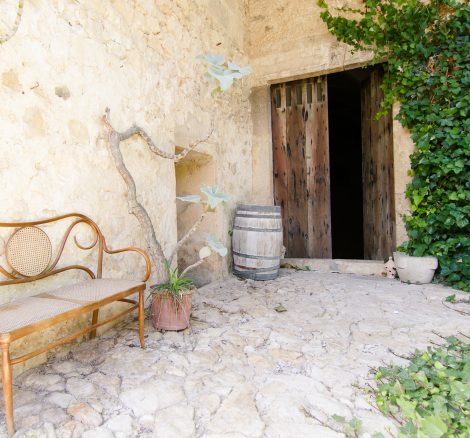 cobbled stone and wooden doorway at mallorca wedding venue Son Sant Andreu
