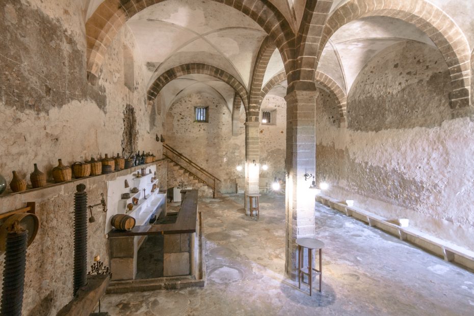 amazing hidden wine cellar with huge stone arched ceilings at mallorca wedding venue Son Sant Andreu